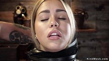 Blonde slave beauty lean on wooden beam with tied hands behind gets tormented