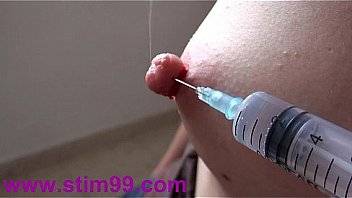 Squirting Saline by Nipple and Extreme Needles Pierced