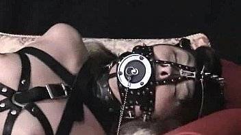 Tied and gagged japanese girl wearing stockings gets fondled by her man