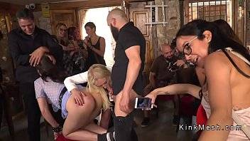 Brunette made to rimjob in public bar