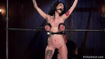 Big tits brunette slut finger fucked and tits whipped in bondage