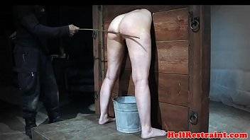 Caned restrained sub sprayed with candlewax