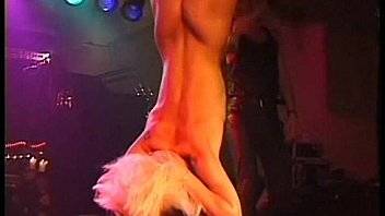 Fetish Club Punishment On Stage of blonde slavegirl in bondage and whipping