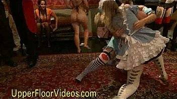 Babe masturbates while flogging at party