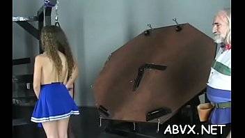 Woman screams with man smashing her fur pie in extreme bondage