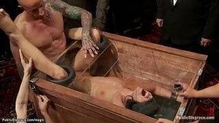 Young brunette slave Adriana Chechik is blindfolded and boxed then big cock fucked by Astral Dust under control of dom Princess Donna Dolore in public