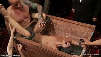 Young brunette slave Adriana Chechik is blindfolded and boxed then big cock fucked by Astral Dust under control of dom Princess Donna Dolore in public