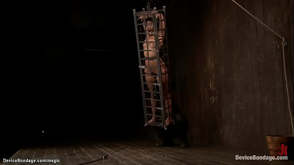 Ebony suffers back arch bondage